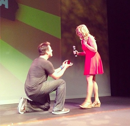 A picture of Philip proposing Lindsay at his show.